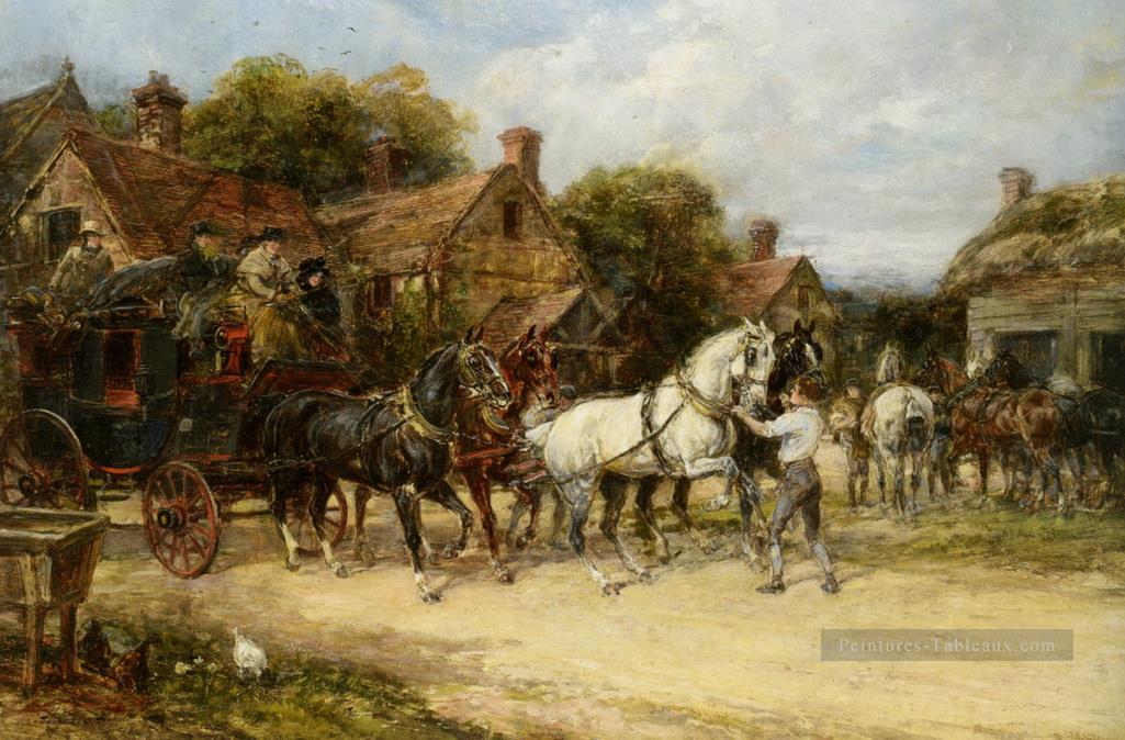 Changement de chevaux Heywood Hardy équitation Peintures à l'huile